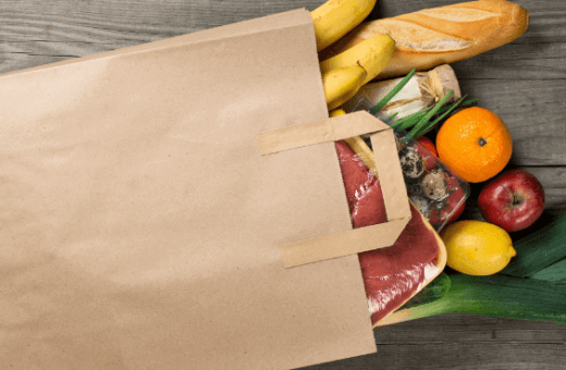 paper packaging shopping bag with food inside