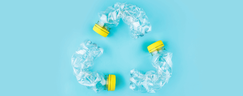 plastic bottles in the shape of the recycling logo