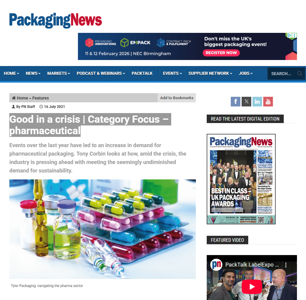 A news webpage titled 'Packaging News' in red and blue, showing typical navigation dropdowns and advertisements. The main article is titled 'Good in a Crisis | Category Focus - Pharmaceutical', with a short description and an image related to pharmaceuticals and medication.